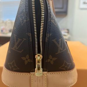 Authentic LV ALMA PM bag.